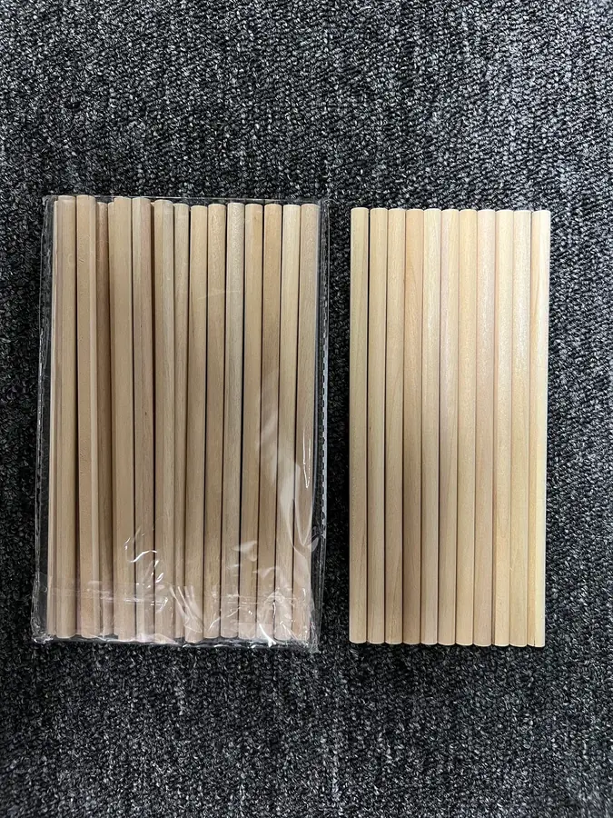 Company sample photograph of unfinished natural wooden pencil bodies